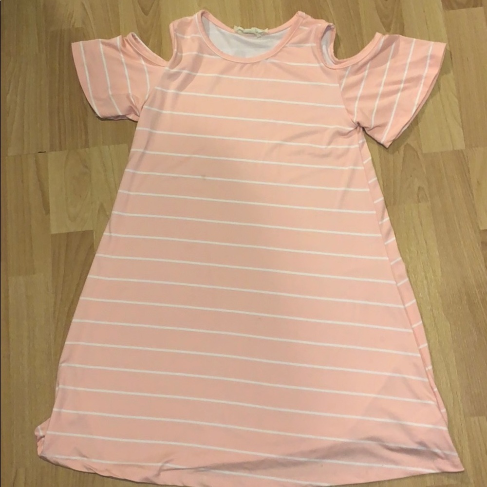A pink stripped shirt